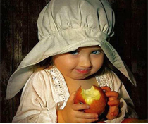 Little Girl in Bonnet with Apples