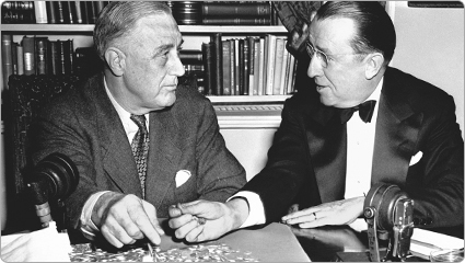 President Franklin Roosevelt, himself a victim of polio, meets with March of Dimes executive Basil O'Connor