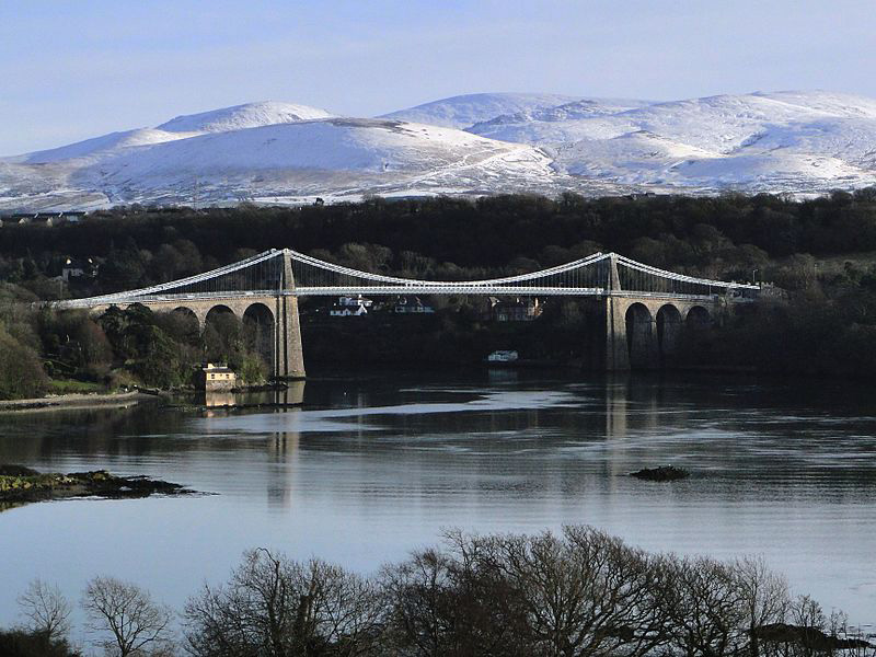 The Menai Suspension Bridge: is a suspension bridge between the island of Anglesey and the mainland of Wales