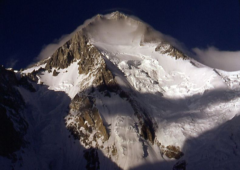 Gasherbrum I (known as Hidden Peak or K5), is the 11th highest peak on Earth, located on the Pakistani–Chinese border in Gilgit–Baltistan region of Pakistan and Xinjiang region of China. (Gasherbrum I is part of the Gasherbrum massif, located in the Karakoram region of the Himalaya)