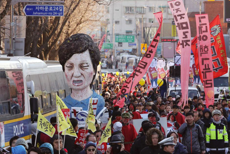 The impeachment of President Park Geun-hye of South Korea in response to a major political scandal is unanimously upheld by the country's Constitutional Court, ending her presidency.