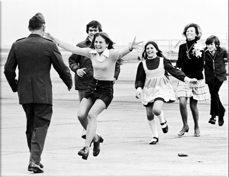 The Pulitzer Prize-winning photograph Burst of Joy is taken, depicting a former prisoner of war being reunited with his family
