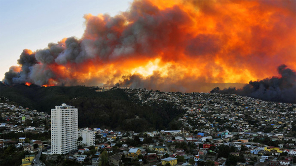 A wildfire ravages the Chilean city of Valparaíso, killing 16, displacing nearly 10,000, and destroying over 2,000 homes.