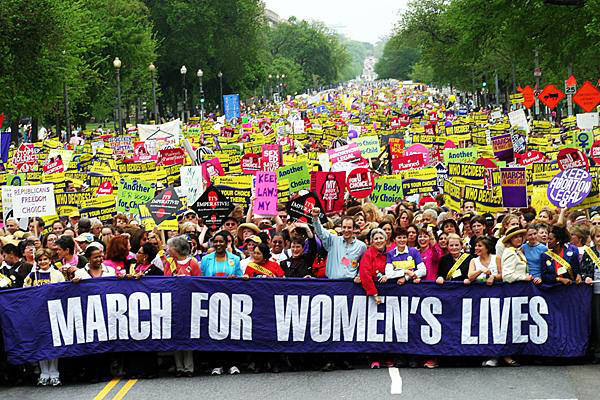 The March for Women's Lives brings between 500,000 and 800,000 protesters, mostly pro-choice, to Washington D.C. to protest the Partial-Birth Abortion Ban Act of 2003, and other restrictions on abortion.
