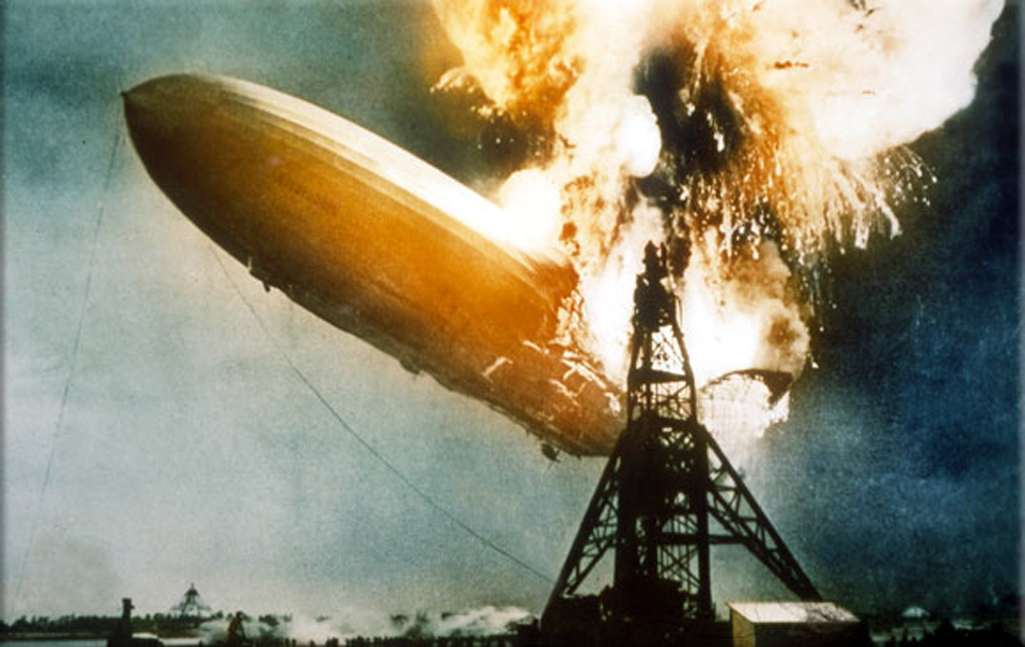 The Hindenburg bursts into blames above Lakehurst, New Jersey, on May 6, 1937. credit: Popperfoto, Getty Images.