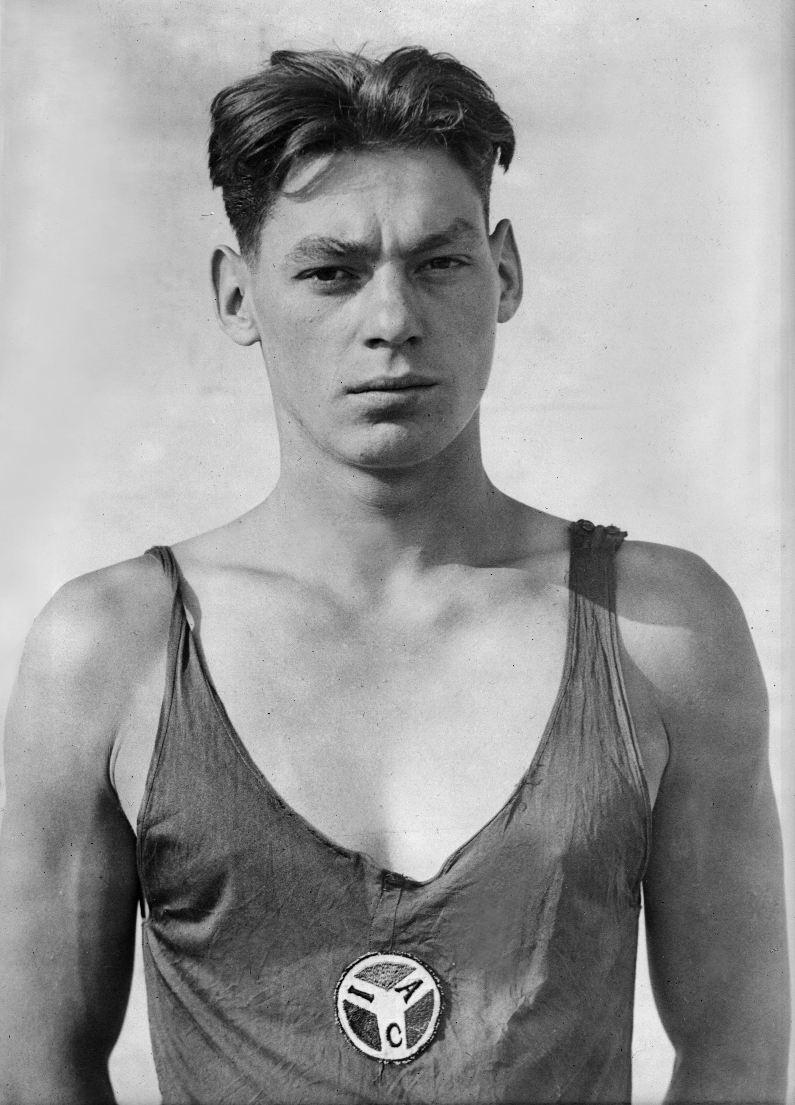Johnny Weissmuller swims the 100 meters freestyle in 58.6 seconds breaking the world swimming record and the 'minute barrier'