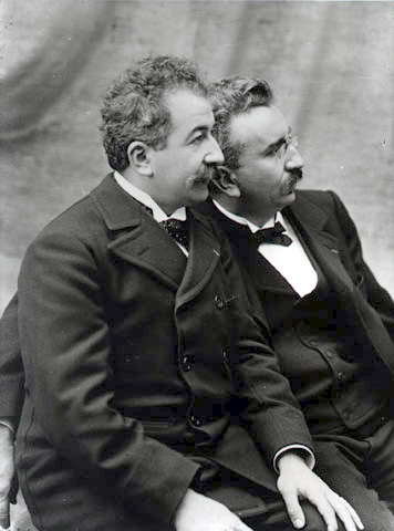The Lumière brothers demonstrate film technology to scientists