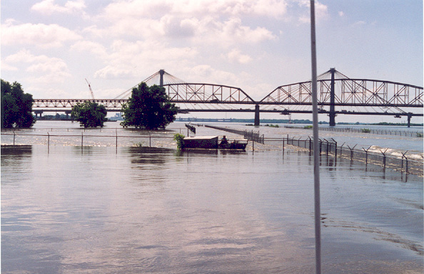 Great Flood of 1993: levees near Kaskaskia, Illinois rupture, forcing the entire town to evacuate by barges operated by the Army Corps of Engineers