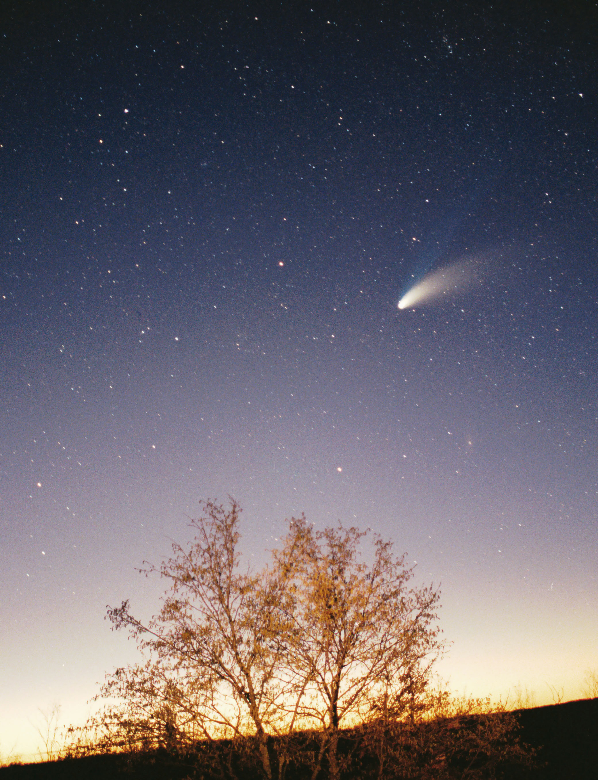 Comet Hale-Bopp is discovered; it will become visible to the naked eye nearly a year later