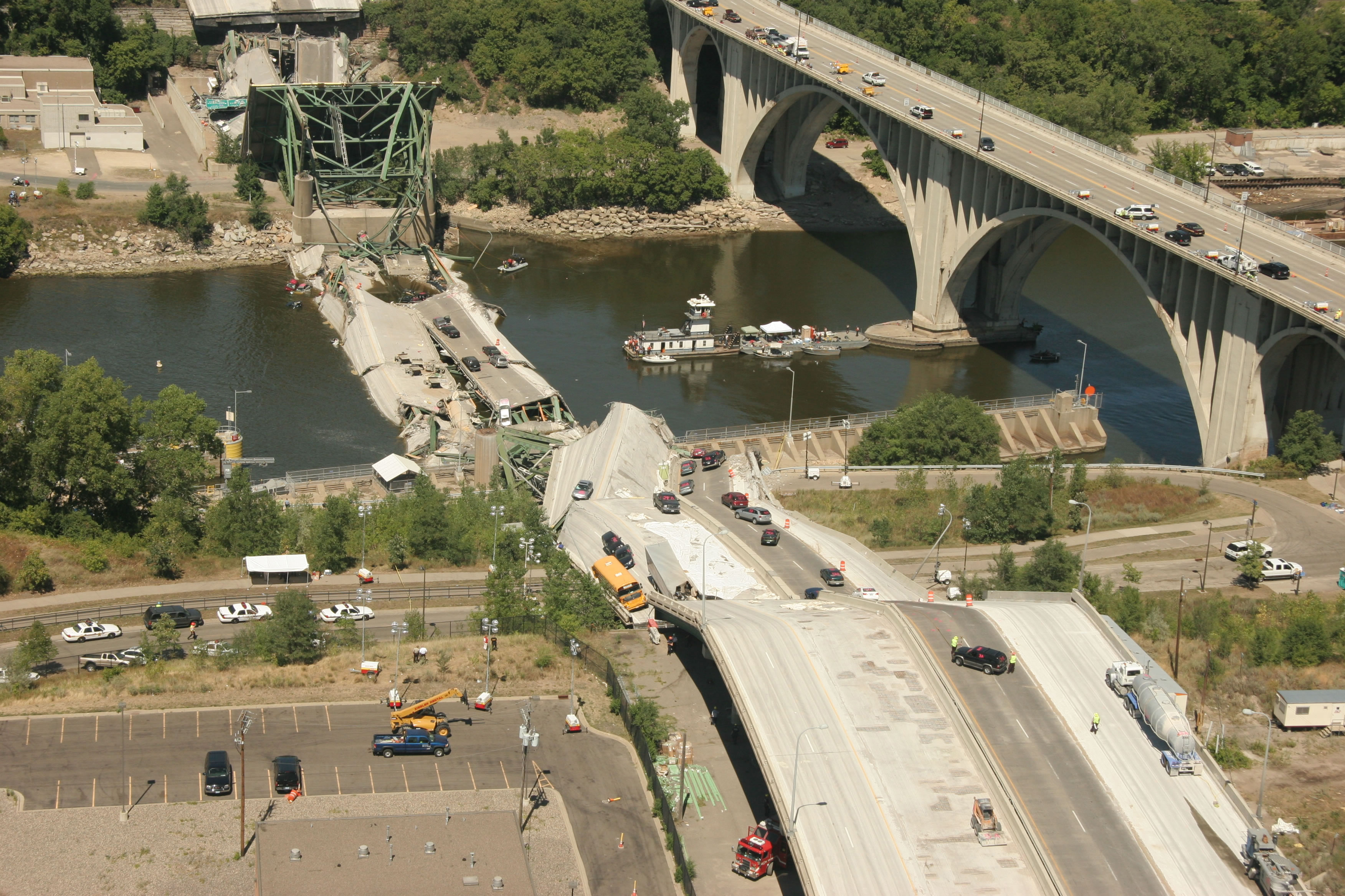 I-35W Mississippi River bridge spanning the Mississippi River in Minneapolis, collapses during the evening rush hour