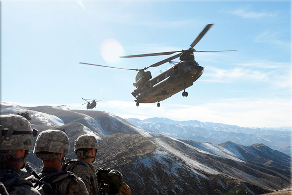 A helicopter containing members of Navy SEAL 6 is shot down in Afghanistan killing 38