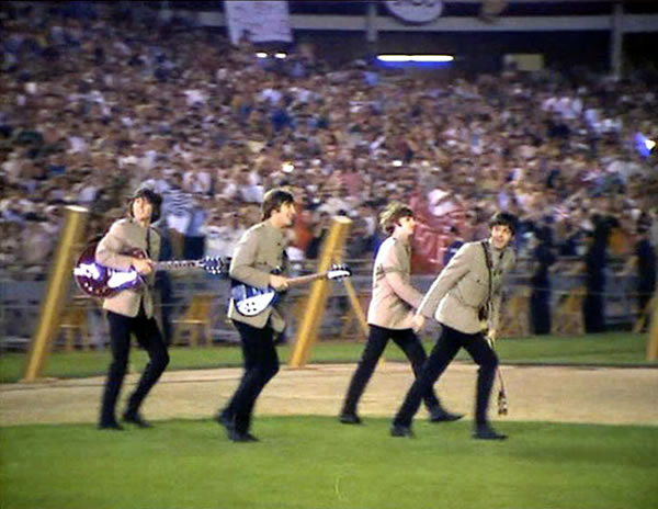 The Beatles play to nearly 60,000 fans at Shea Stadium in New York City, in an event later seen as marking the birth of stadium rock