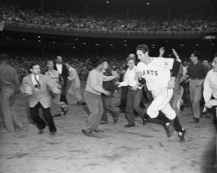 'Shot Heard Round the World', one of the greatest moments in Major League Baseball history, occurs when the New York Giants' Bobby Thomson hits a game winning home run in the bottom of the ninth inning off of the Brooklyn Dodgers pitcher Ralph Branca, to win the National League pennant after being down 14 games