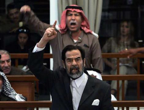Saddam Hussein, former president of Iraq, and his co-defendants Barzan Ibrahim al-Tikriti and Awad Hamed al-Bandar are sentenced to death in the al-Dujail trial for the role in the massacre of the 148 Shi'as in 1982