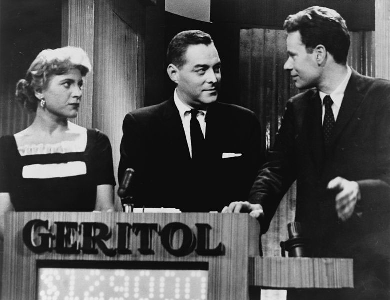 Quiz show scandals: Twenty One game show contestant Charles Van Doren admits to a Congressional committee that he had been given questions and answers in advance