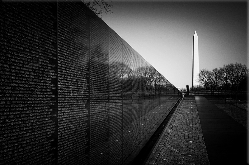 The Vietnam Veterans Memorial is dedicated in Washington, D.C. after a march to its site by thousands of Vietnam War veterans