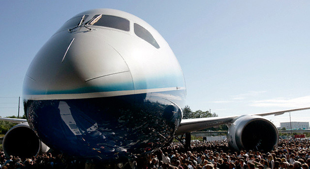 The Boeing 787 Dreamliner aircraft makes its public debut July 8, 2007, amidst employees and special guests outside the Boeing assembly plant in Everett, Washington, credit Robert Sorbo / Corbis